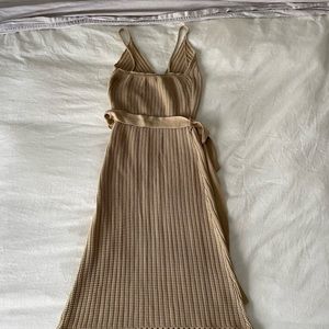 Knitted dress, very flattering and sexy.